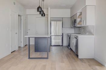 Stand-alone large kitchen islands with dining for five*